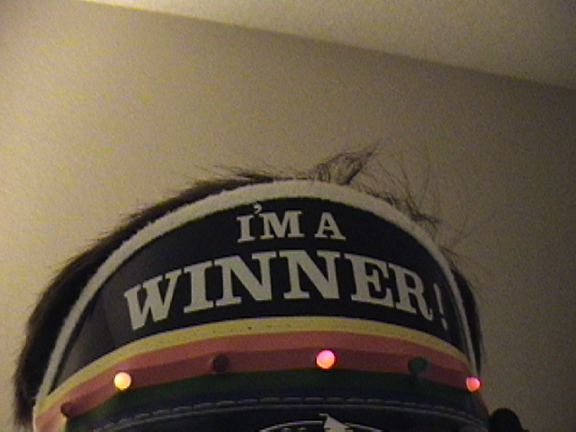 i am a winner on top of a hat