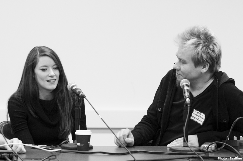 a young man and a younger woman sharing a joke at the same time