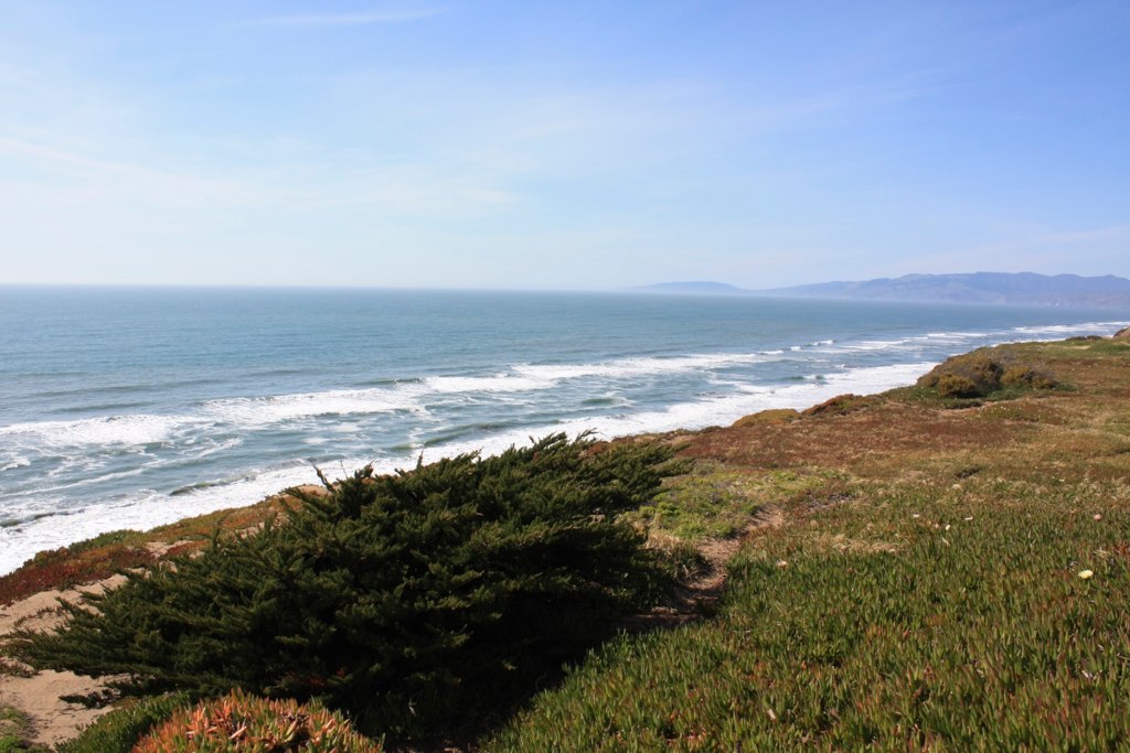 a view over the ocean of some pretty waves