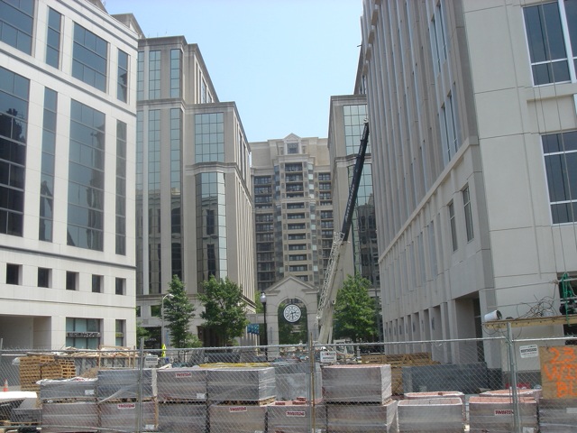 an empty street in the middle of a city