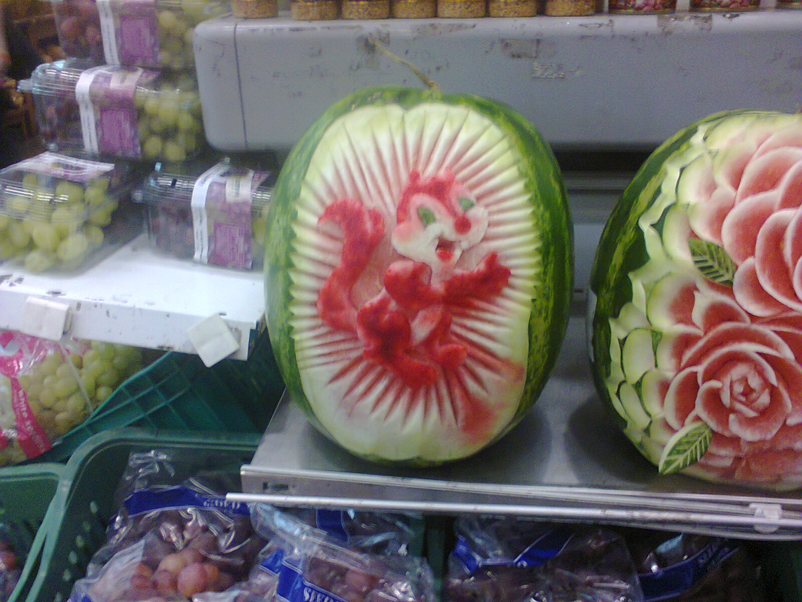 this is a sliced up watermelon with flowers on it