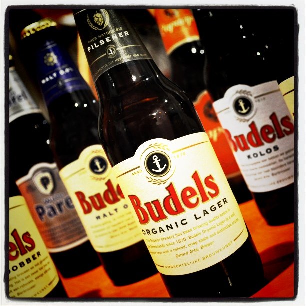 a bunch of bottles of beer are sitting on a table