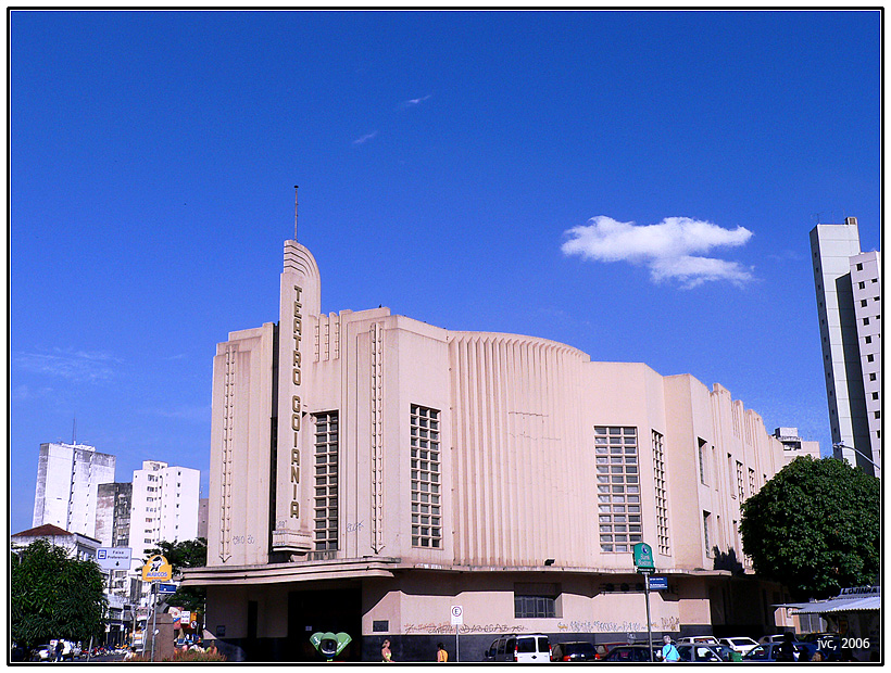 the building has an unusual shape and many stories