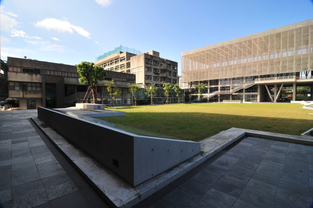 the grassy area in front of several buildings
