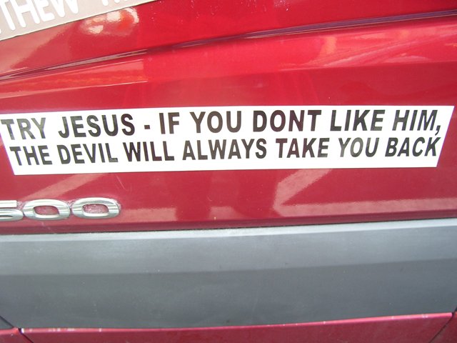 a sticker on the back of a car that is saying try jesus if you don't like him the devil will always take you back