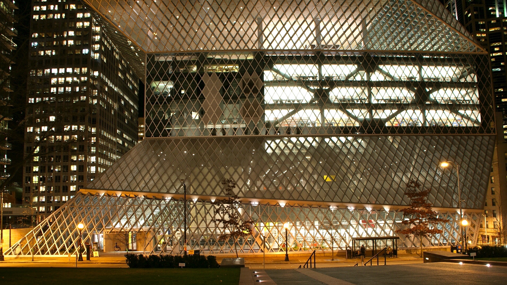 a big building with a very futuristic glass window