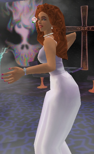 a woman in a white dress is standing in a room with a lit candle