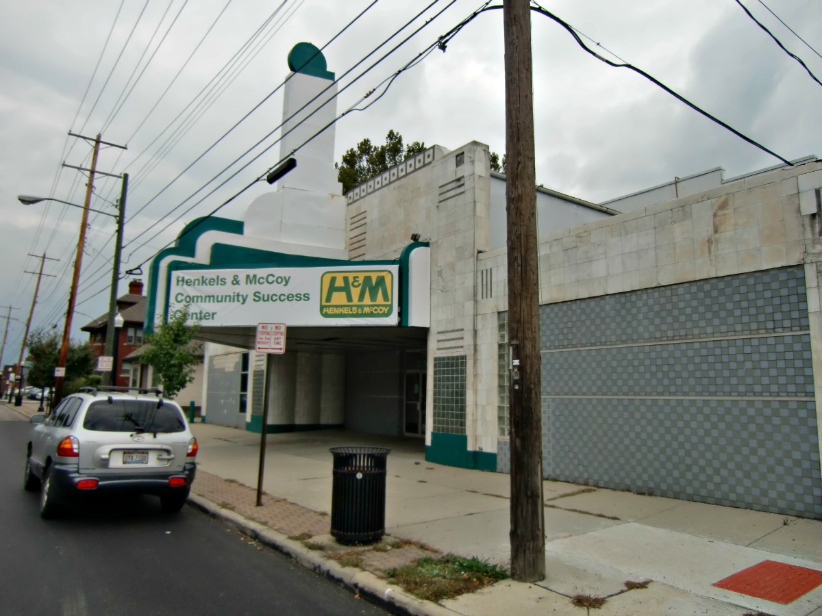 a large garage building with a parking meter