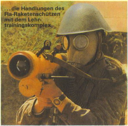 a soldier using a pair of goggles