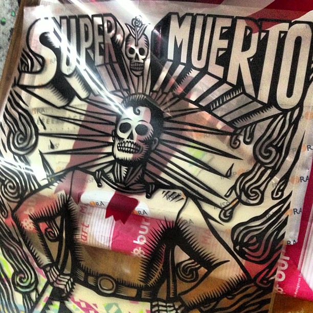 an artistically designed cloth with a skeleton on it
