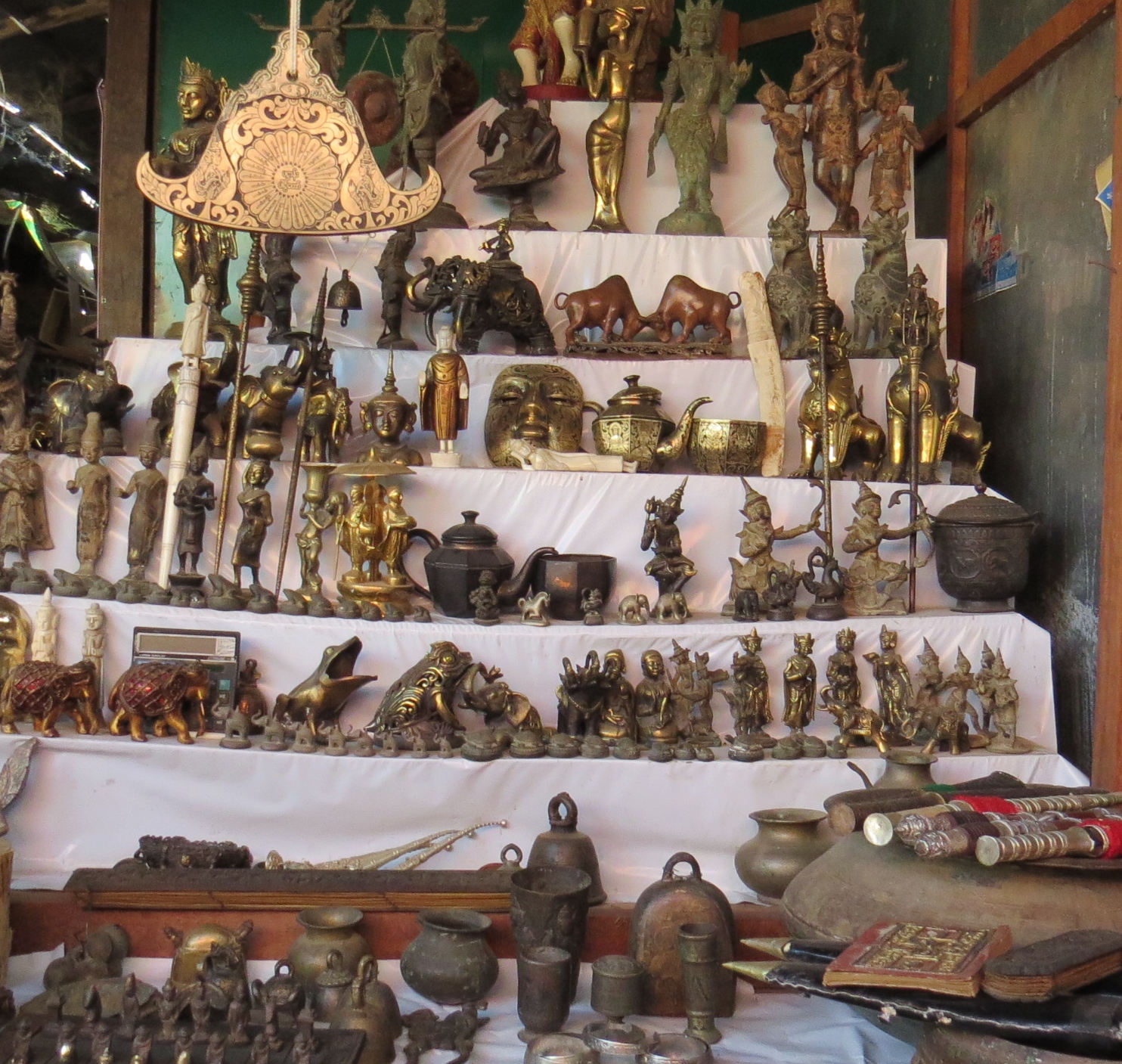 many small sss on a table and some figurines