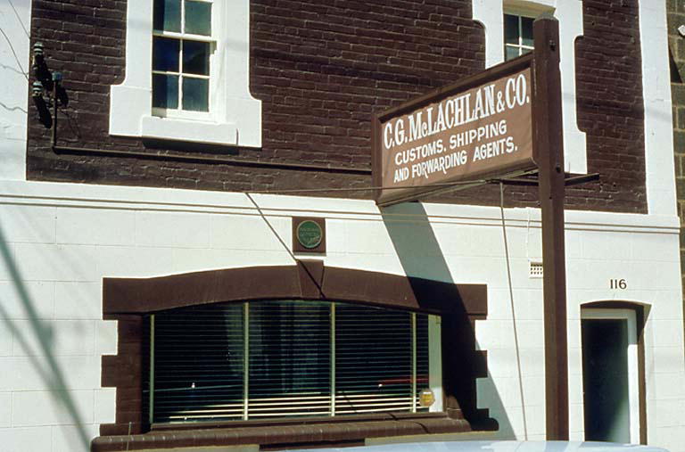 an outside view of a building and sign