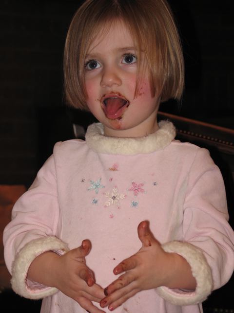 a  covered in food posing for the camera