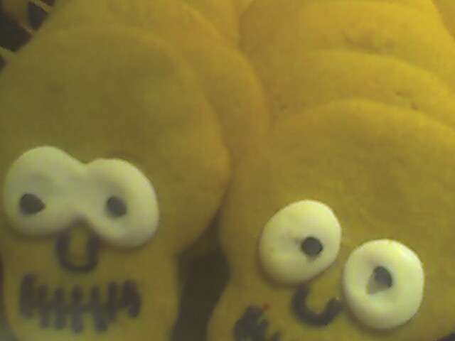 stuffed toy yellow and white skulls with googly eyes