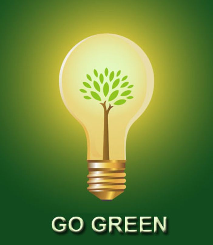 the green light bulb with a tree in it that reads, go green