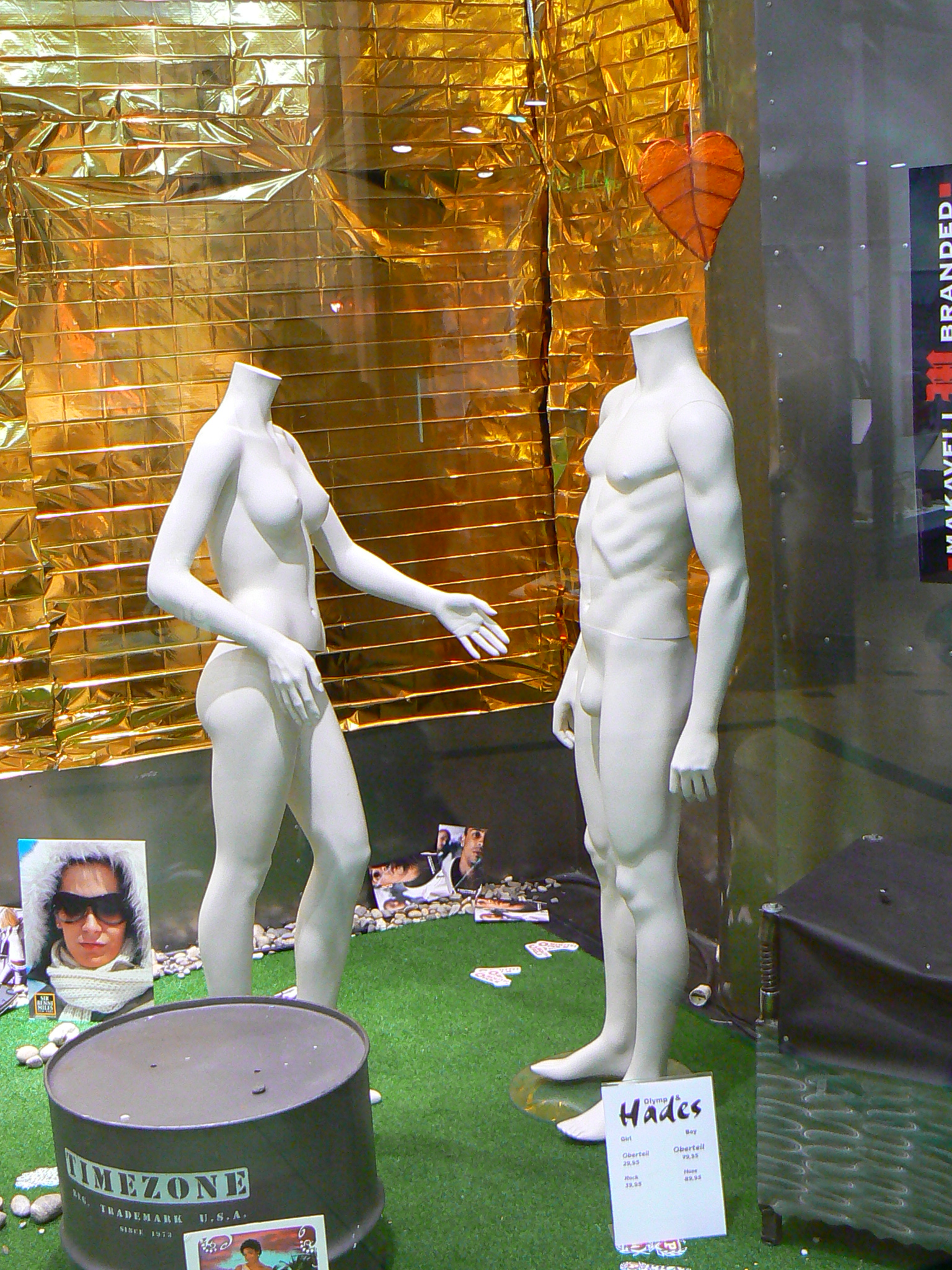 two male and female mannequins next to each other