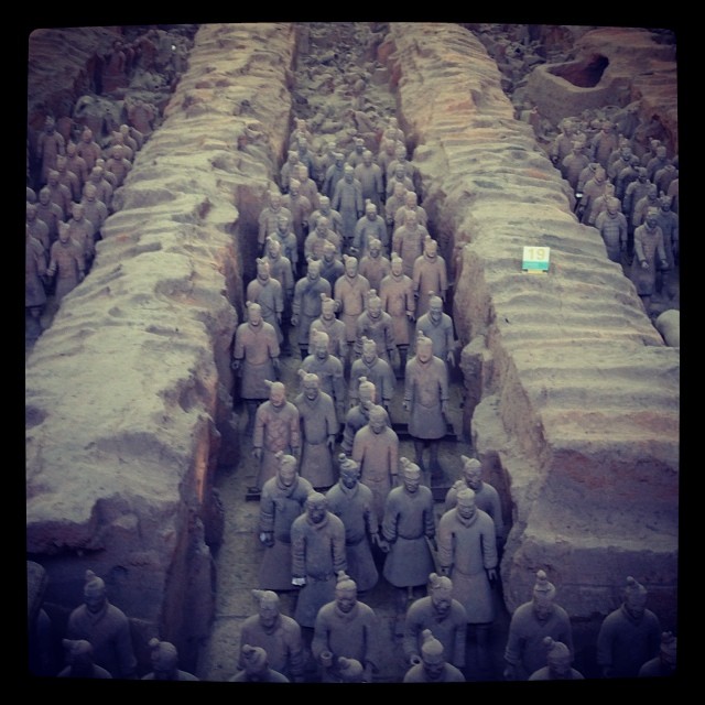 rows of individual statues lined up next to each other