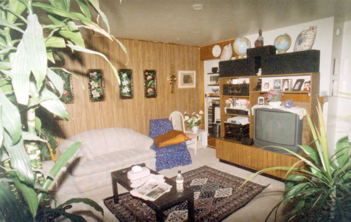 an old picture of living room in a house