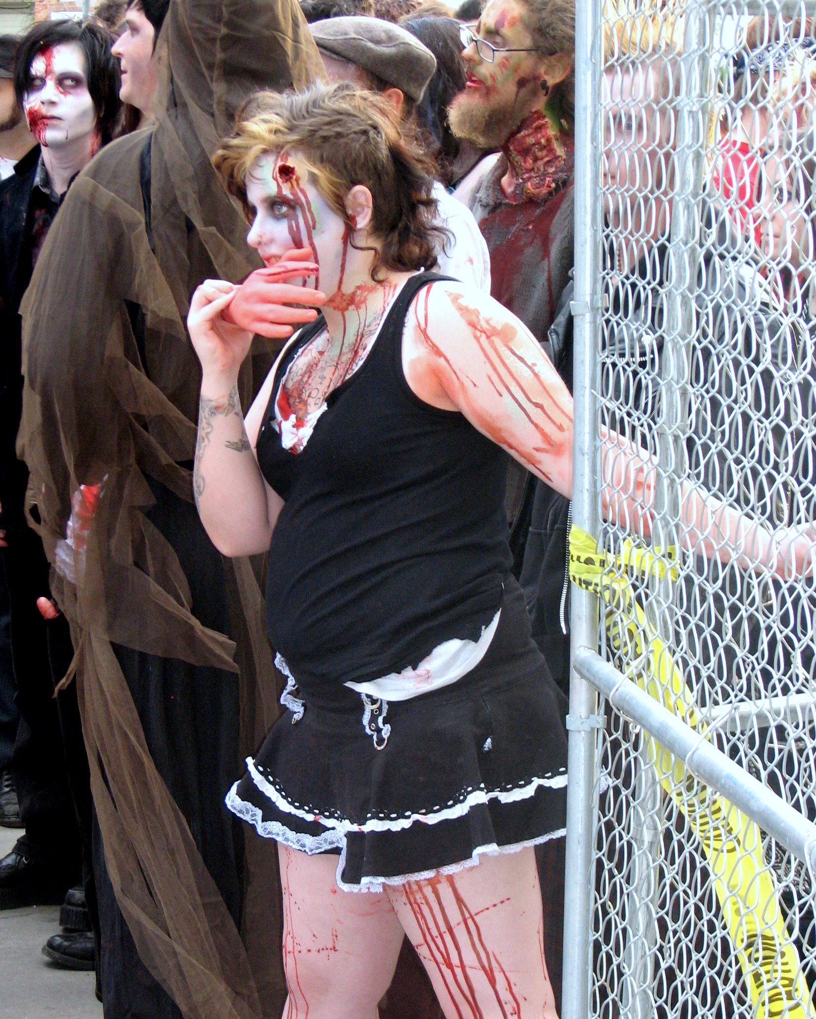 people in costumes are lined up with  on their faces