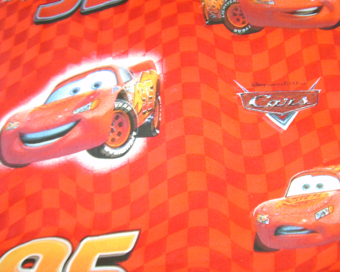closeup of a wallpaper depicting cars with cars on it