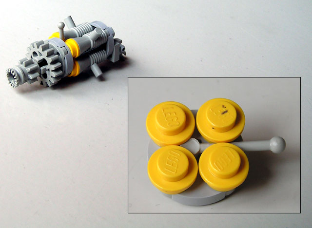 three lego yellow round s laying next to one