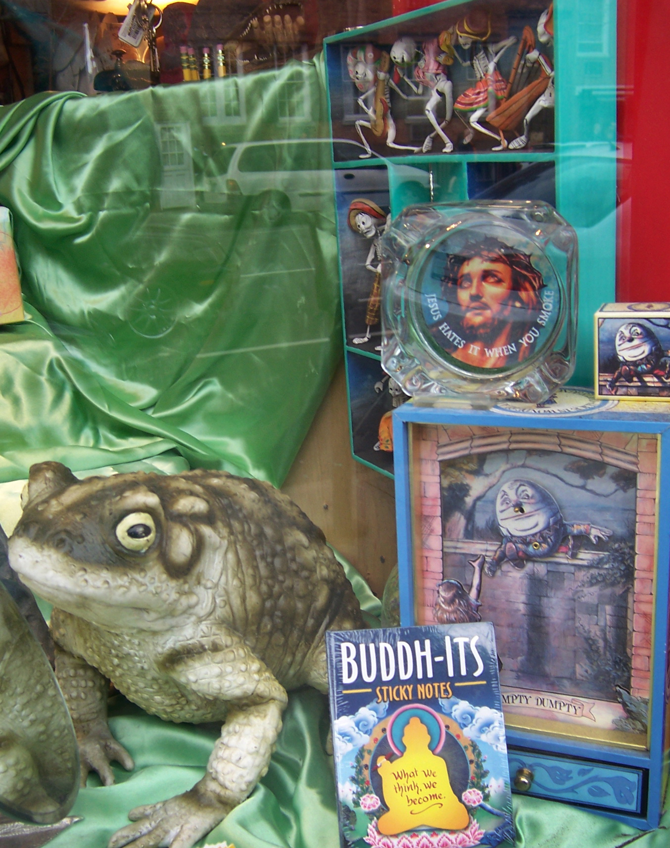 the front window of an animated shop with various items