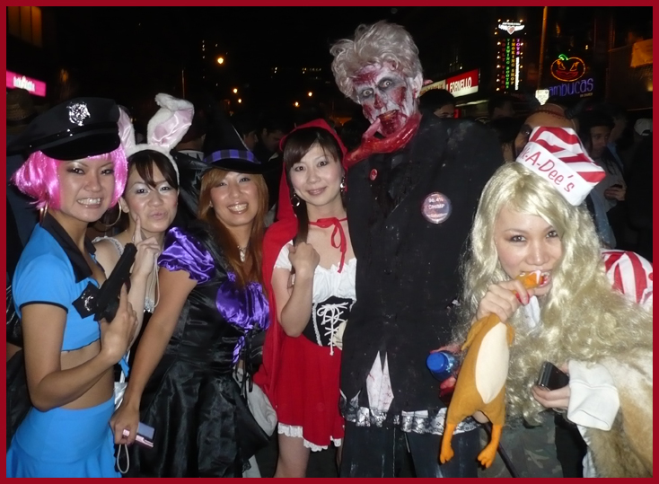 a group of people posing with costumes on