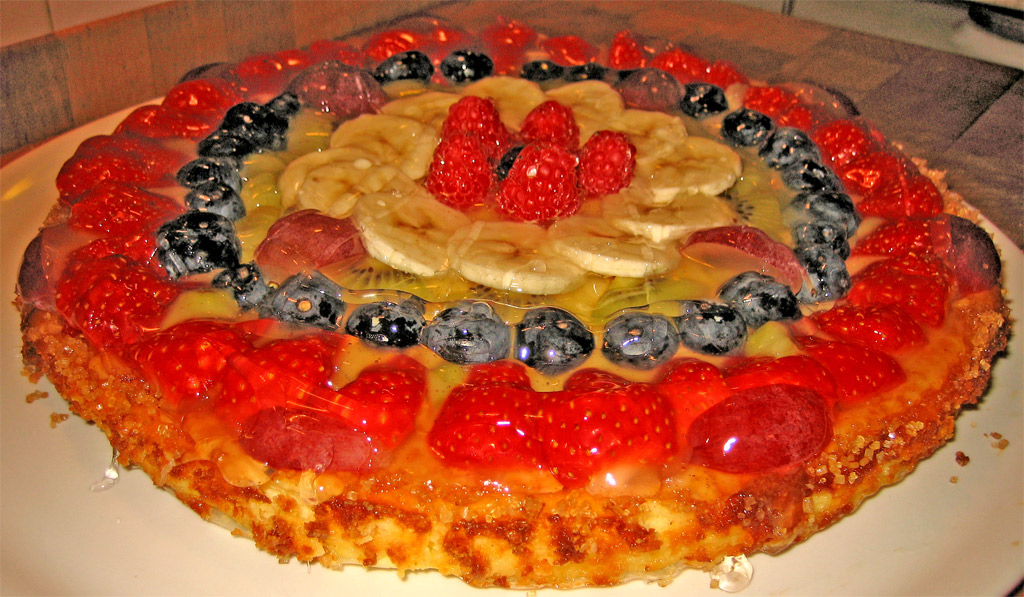 a fruit pie is shown on a plate