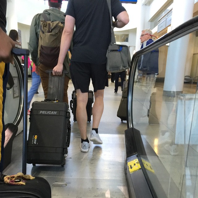there are three male travelers with their luggage