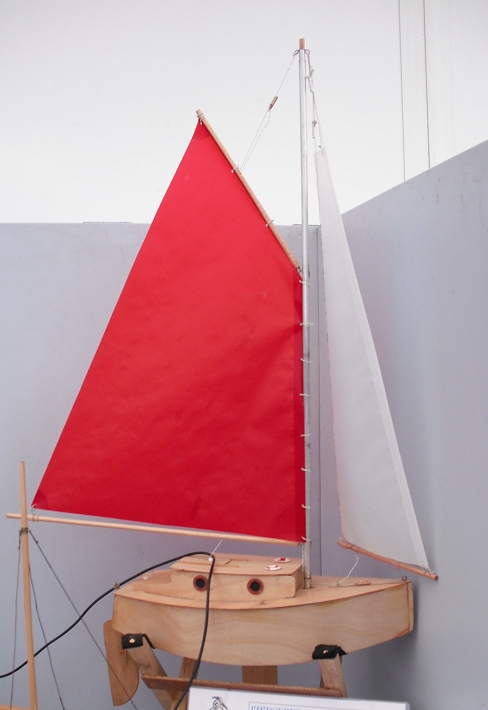 the sailboat is on display in the museum