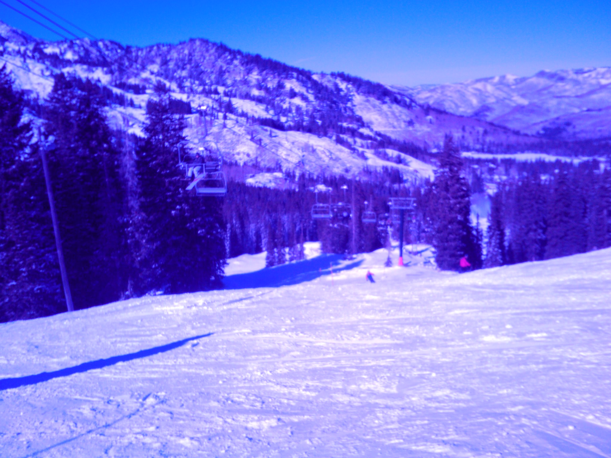 a person on a snowboard is in the snow