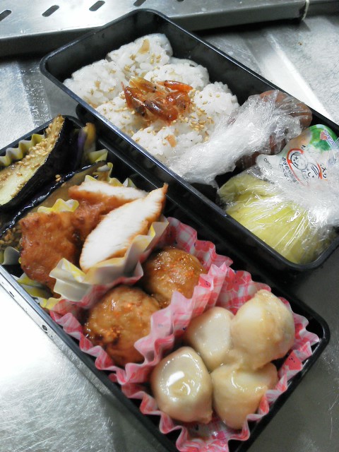 an array of food sitting inside of a plastic container