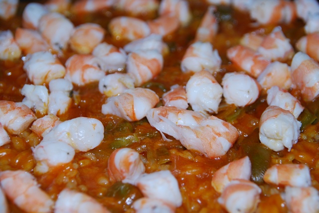 a cooked pot of shrimp and red chili