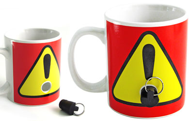 the coffee mug is decorated like a traffic sign