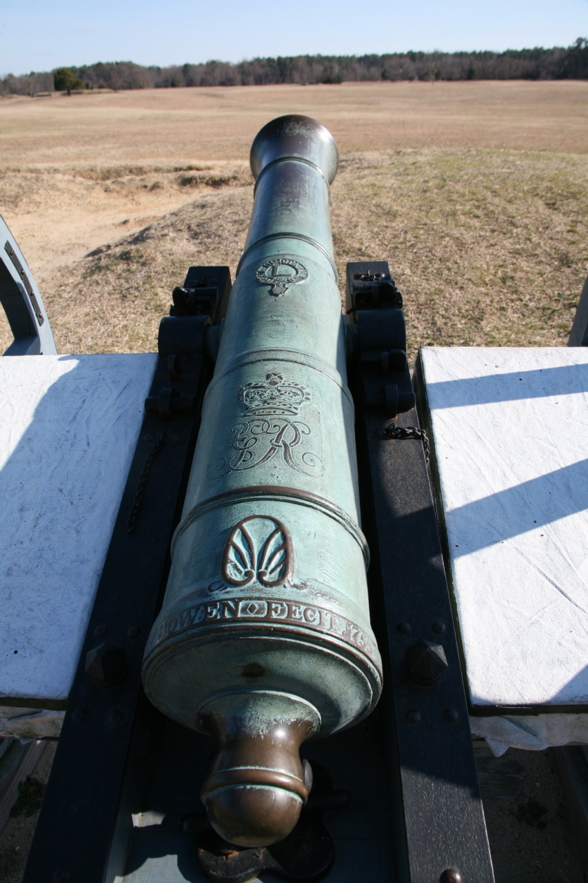 the cannon has been placed on the back of a military vehicle