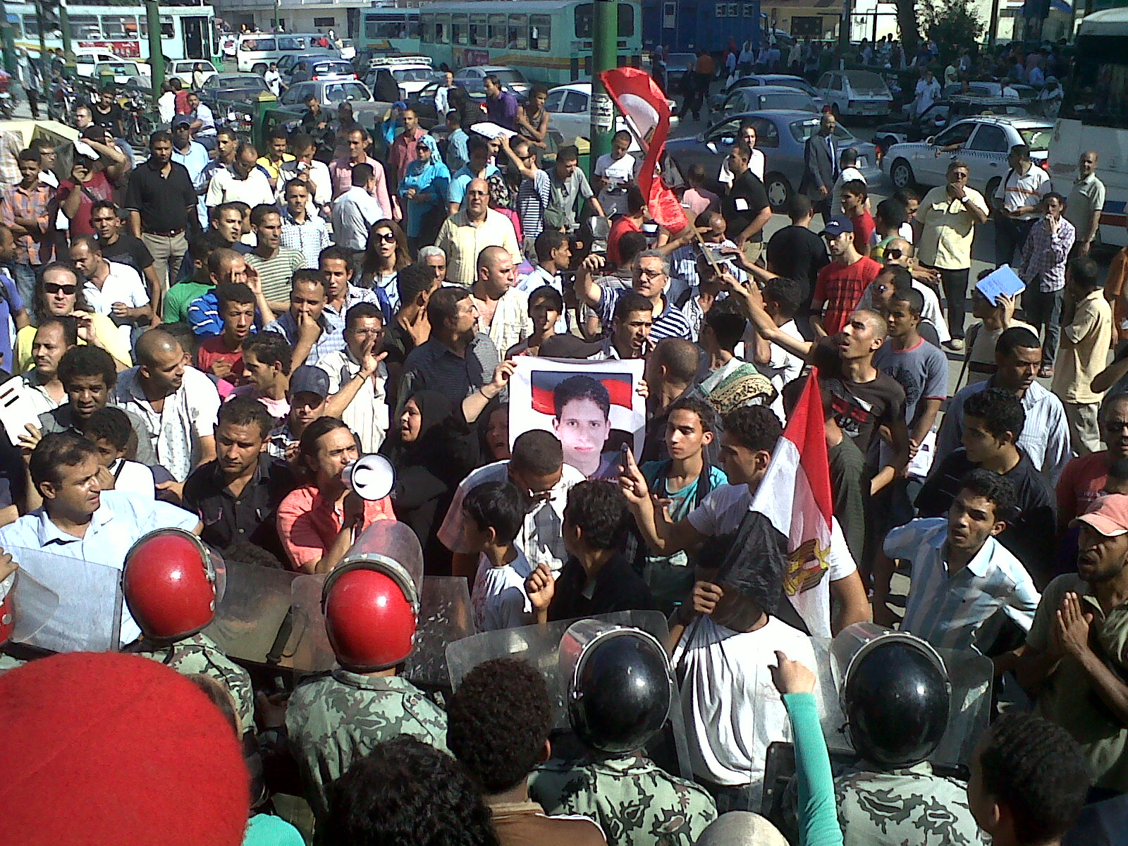 a bunch of people that are standing in the street