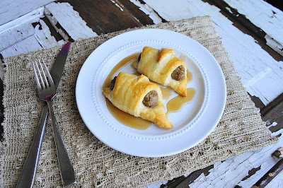 a plate with a meal in a pastry on it