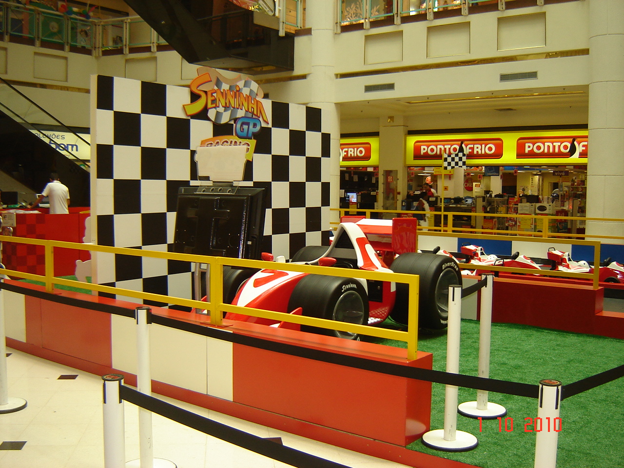 the front of a racing car at a shopping mall
