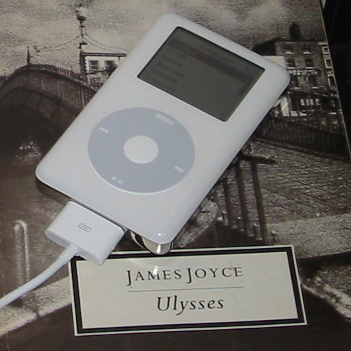 a small ipod plugged in to an electronic device
