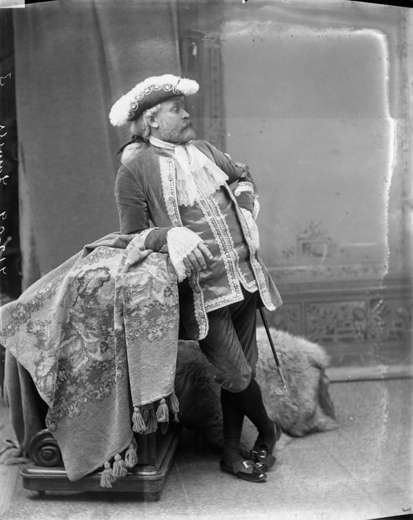 an old po of a man dressed in costume