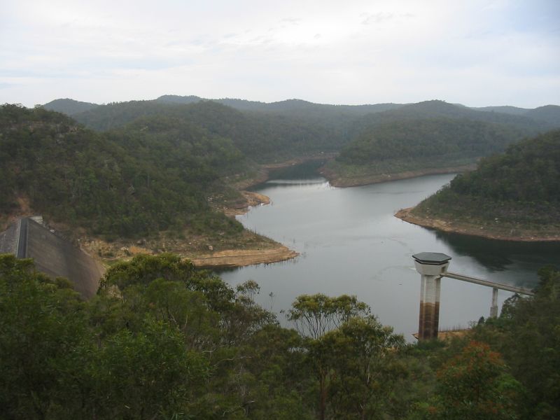 a large body of water surrounded by trees