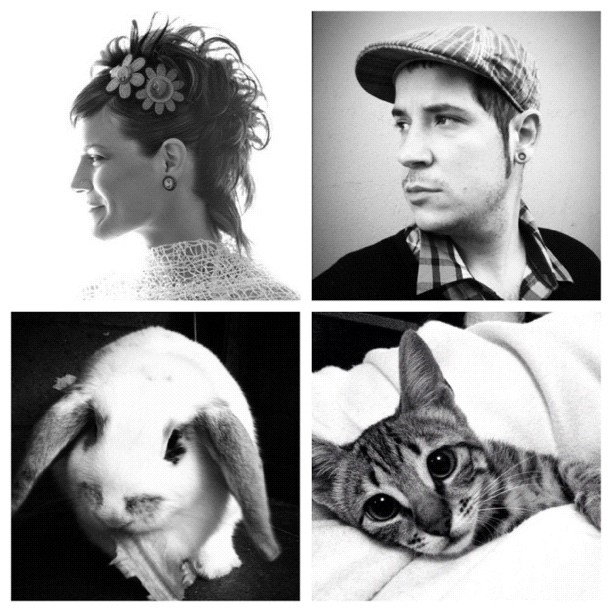black and white pograph of cat and a rabbit