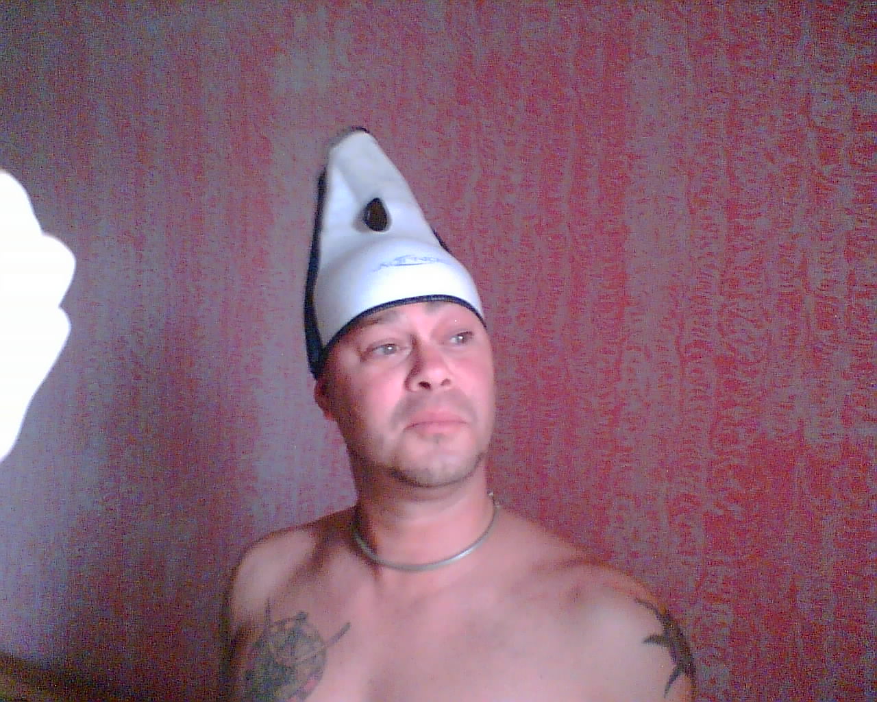 a man with a hat on his head