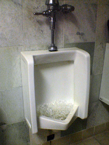 there are many white things in this men's urinal