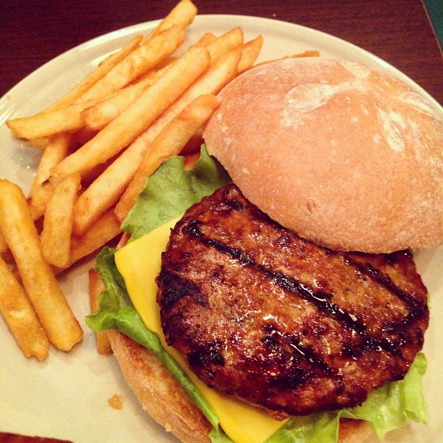 hamburger and french fries are on a plate