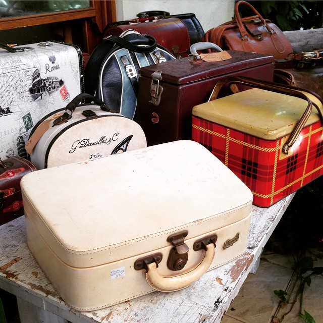 a group of suitcases that are sitting on a table