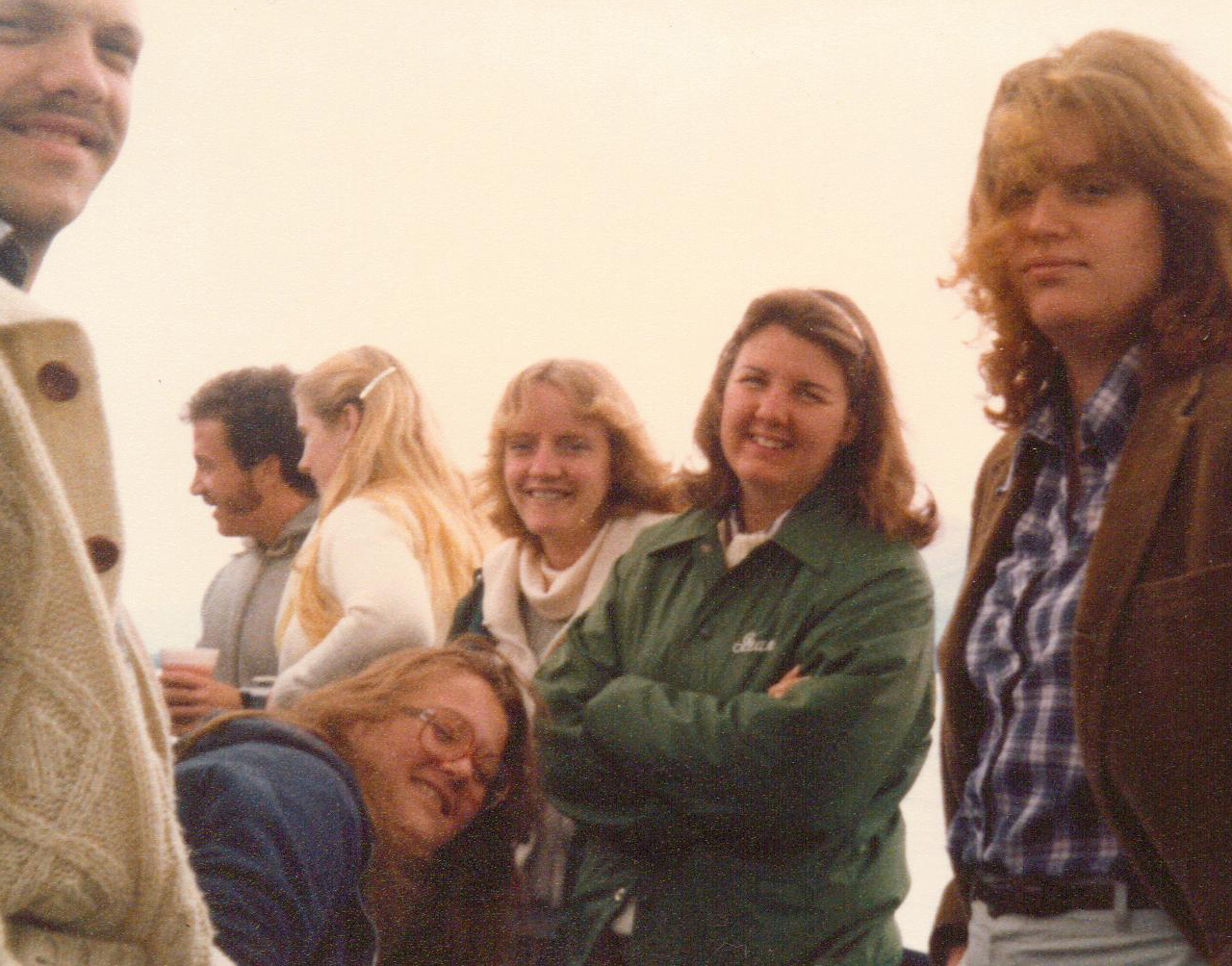 a group of people that are all posing for the camera