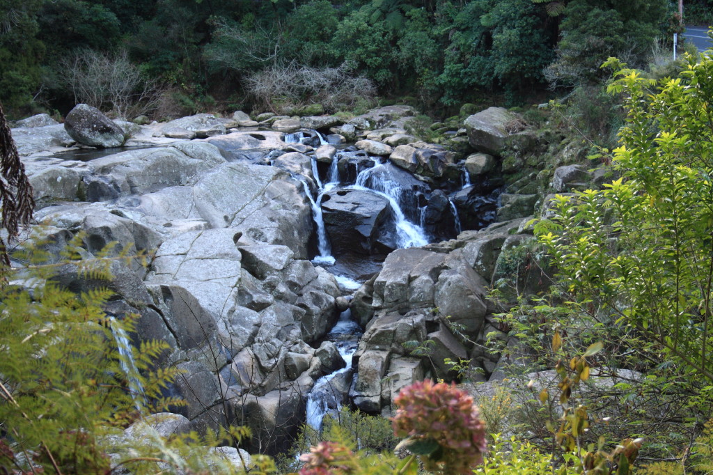 this is a large waterfall at the base of a tree