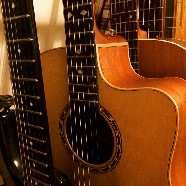 there is an acoustic guitar that can be seen with its case