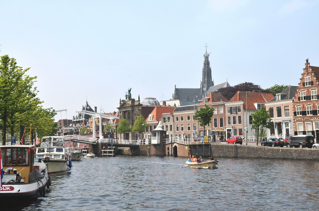 a couple of boats on the water near buildings